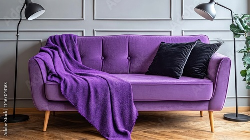 Purple velvet sofa in modern living room photo