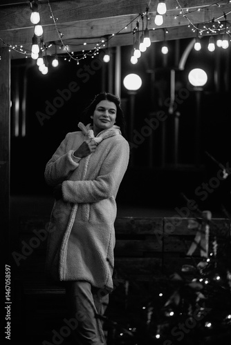 Tableau sur toile Portrait of a young beautiful dark-haired girl in the night city
