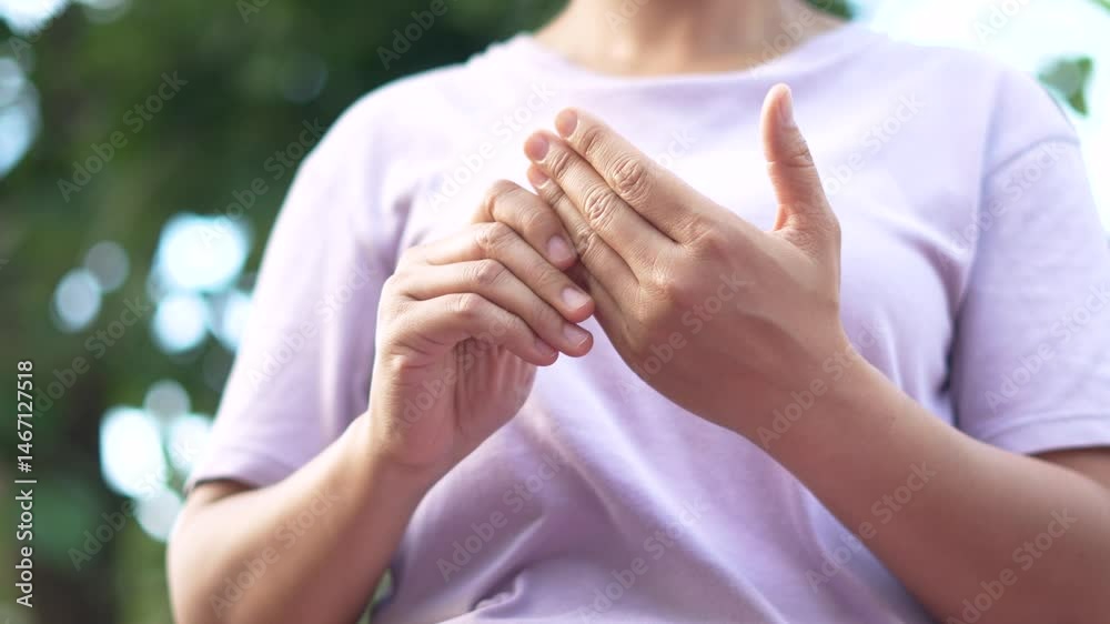 A woman has pain in her hands and joints.