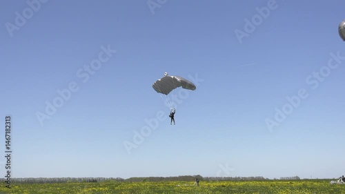 Parachute jump precision landing of a military paratrooper