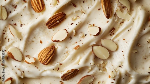8. Close-up of vanilla almond ice cream with sliced almonds on top, capturing the creamy texture