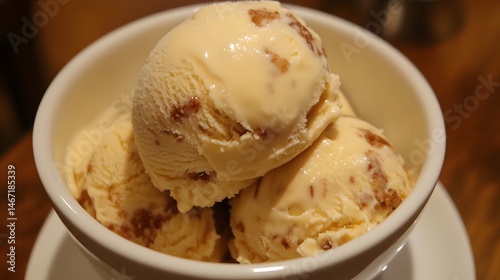 57. Macro shot of butterscotch ice cream with a butterscotch swirl