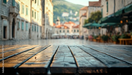 Fototapeta Naklejka Na Ścianę i Meble -  A wooden table with a view of a city street