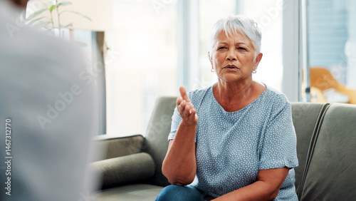 Senior woman, counseling and sofa with therapist for discussion, mental health or therapy session. Elderly, female person or talking with counselor for psychology consultation, amnesia or dementia