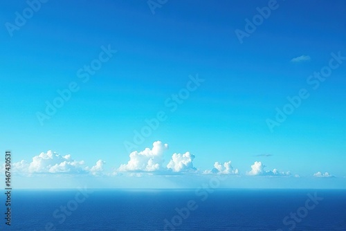 Deep blue, cloudless sky stretches to the horizon , open, bright