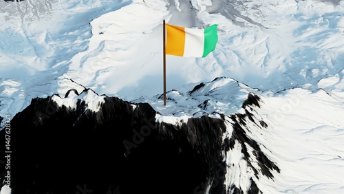 3D rendering of the Côte d'Ivoire national flag, featuring three equal vertical bands of orange, white, and green, gracefully waving atop a snow-covered mountain peak, symbolizing national unity and p