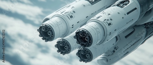 Fototapeta Naklejka Na Ścianę i Meble -  Futuristic, white spacecraft engines against a cloudy sky.  Detailed, complex engine design with multiple nozzles and components are visible.  Sleek, almost metallic appearance