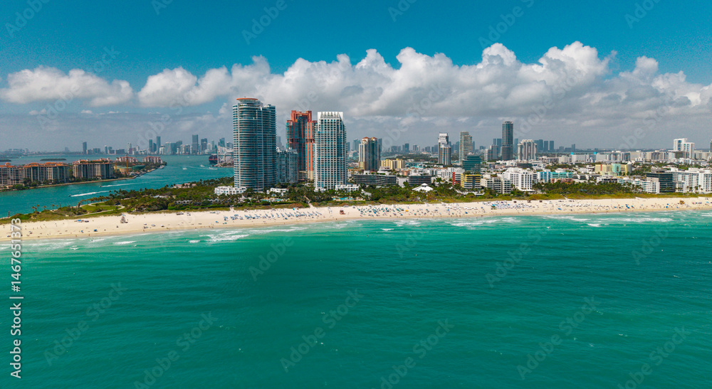 Naklejka premium Miami Beach aerial view with skyline. Miami from above. Miamis famous landmarks. South Pointe beach with skyscrapers. Miami city panorama. Miami skyline and ocean.