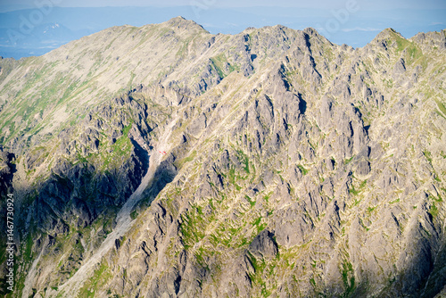 Fototapeta Naklejka Na Ścianę i Meble -  Helicopter TOPR against the background of high mountain. Tatra Mountains. Majestic mountain peaks.