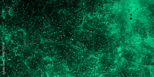 Abstract texture of a deep green, cloudy background with stormy sky or turbulent cosmic nebula. Soft blending between darker forest green areas and lighter emerald or jade. Vivid, moody, atmosphere