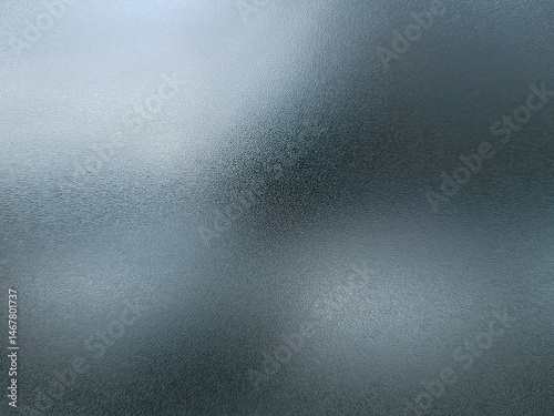 Abstract blurred background concept or frosted glass pattern. Black tone gradient light gives a rough feeling.