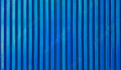 uniformly textured surface composed of numerous parallel, abstract light blue wooden slats arranged vertically, creating a clean and simple pattern with subtle variations in tone and shadow.