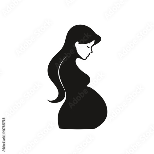 Silhouette of a Pregnant Woman Contemplating Motherhood