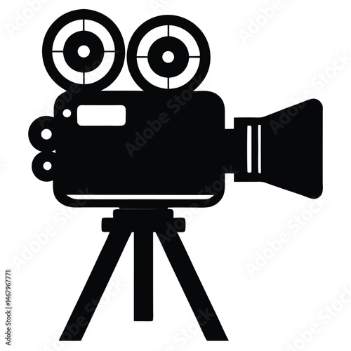 An old vintage movie camera stands on a tripod in solid black color