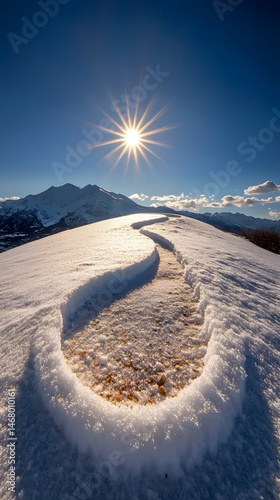 Snowy Hilltop Path with Sun and Fog