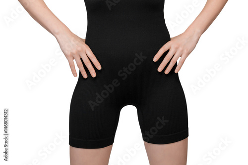 Obraz na płótnie Detailed view of grey ribbed high-waisted shorts on a woman's lower body. The ribbed knit texture and high-waisted design are clearly visible. Studio lighting, white background. w salonie