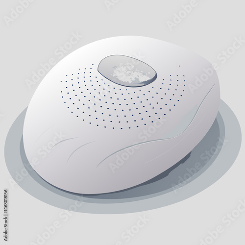 A white speakers featuring a distinct black dot on its body.