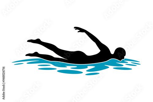Silhouette of swimmer in water swimming freestyle
