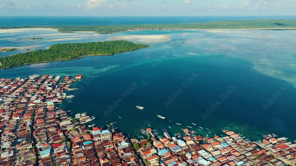 Beautiful drone view a floating village of the Bajo tribe on Wangi-Wangi Island, Wakatobi, Southeast Sulawesi, Indonesia