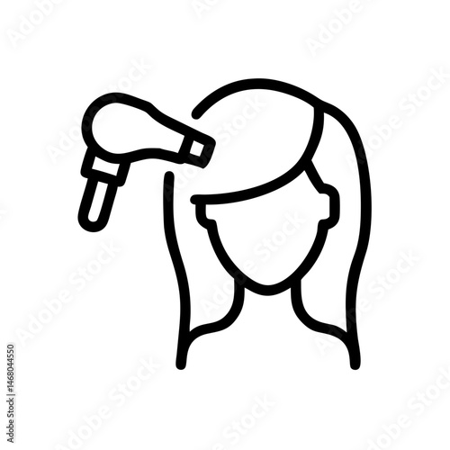 Woman using a hairdryer while styling her hair  