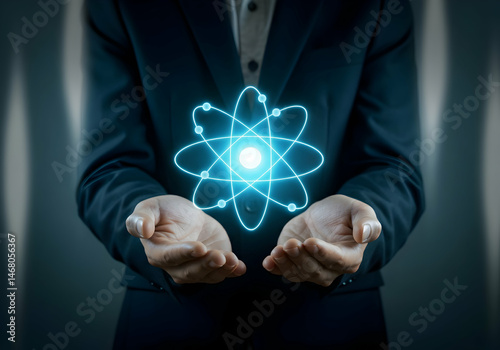 Scientific Power and Innovation Represented by Atom Symbol Man Holding Atomic Structure Hologram