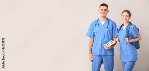 Fotografie Portrait of medical students on light background with space for text