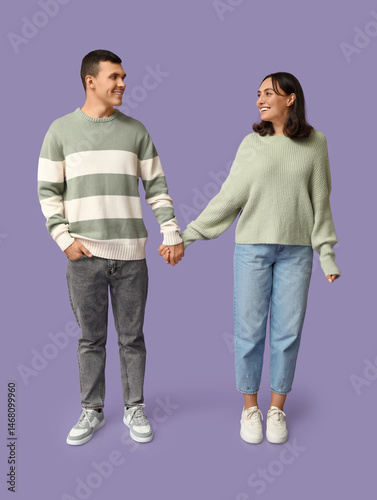 Happy young couple holding ...