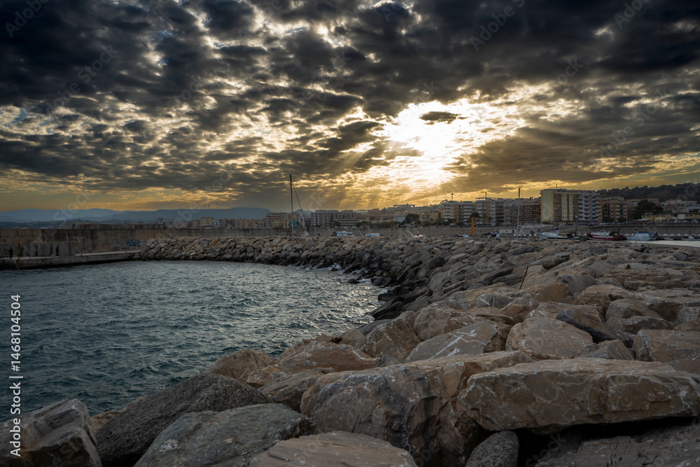 Fototapeta premium sunset on a cliff of a port