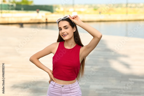 Beautiful young woman with ...