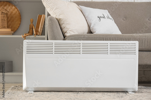 Modern convector heater on ...