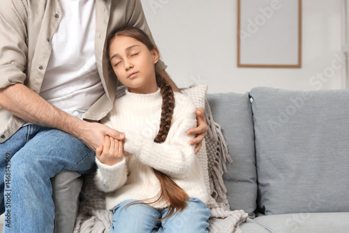 Apologetic father hugging h...