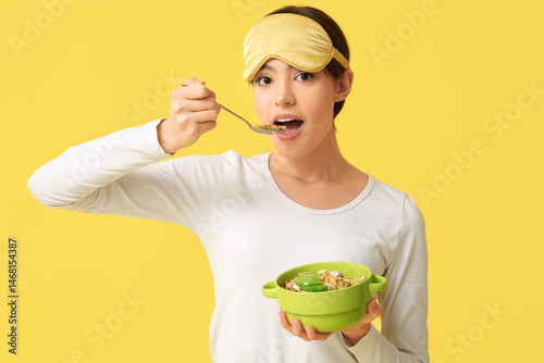 Young woman with sleeping m...