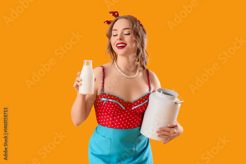 Young pin-up housewife with...