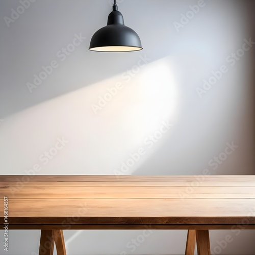 Empty Wooden Table with Pendant Light and White Wall Background