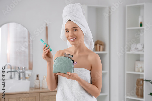 Young beautiful woman wrapp...