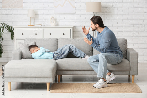 Young father and his little...