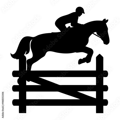 Silhouette image of equestrian rider and horse jumping over a fence