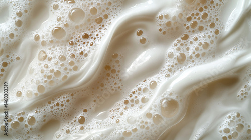 Creamy white foam bubbles texture background closeup