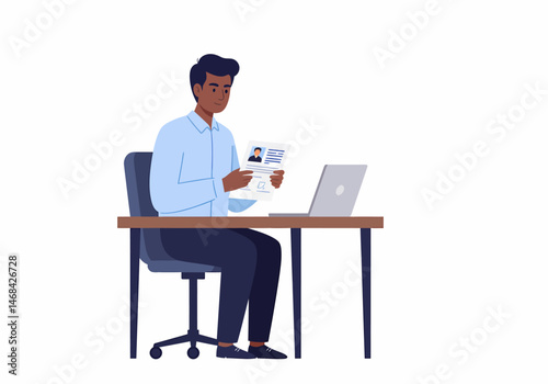 African Man Reviews Job Application with Laptop at Office