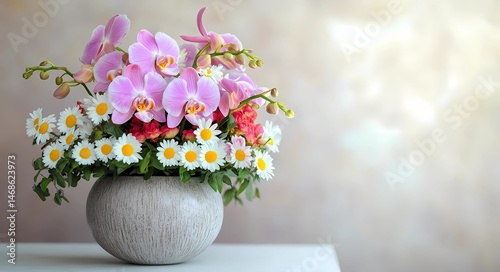 Chic Floral Centerpiece with Orchids and Daisies.