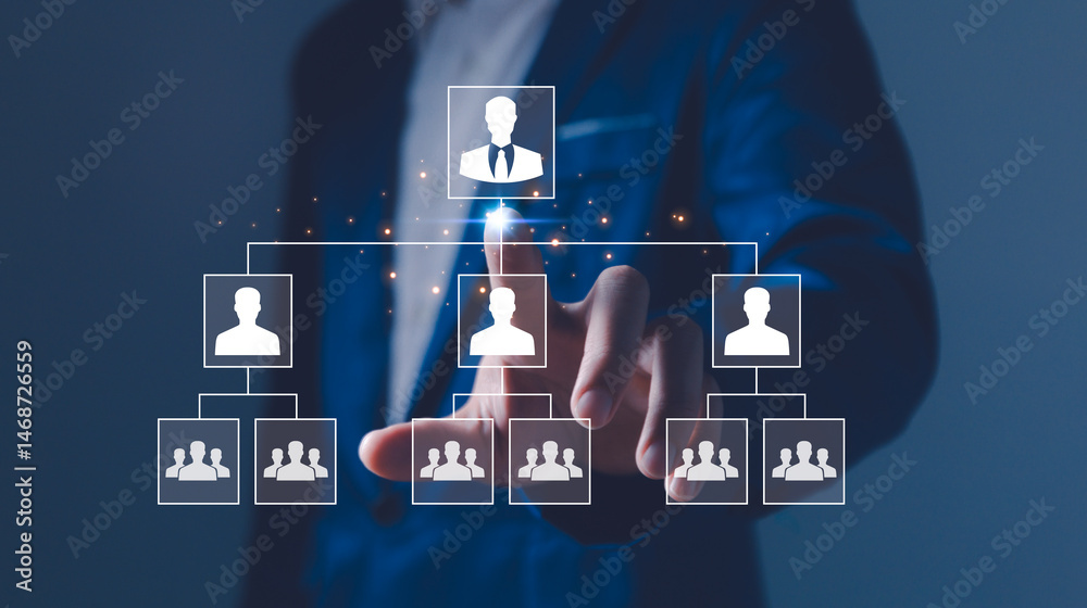 Businessman point a glowing digital organizational chart, leadership and team structure. Manager team management of company, networking in business hierarchy job concept, president job change control