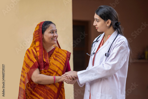 Concept of Indian rural women health in India. Indian female doctor consulting to unhealth rural woman. Rural India healthcare concept. Protection of cervical cancer in india
