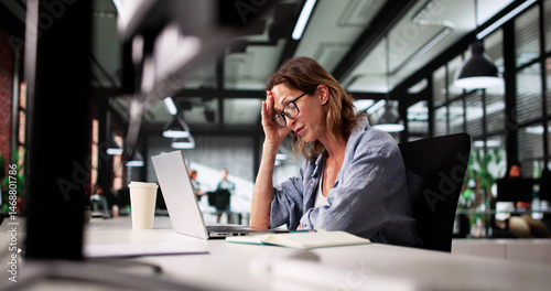 Stressed Female Accountant Worker Looking Unmotivated And Overwhelmed