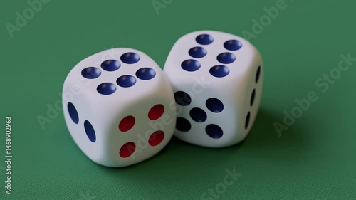 3d animation of two red dice layingon a green game table. Camera moving to dices showing two sixes, creating a moment of suspense and luck photo