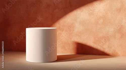 Cylindrical Podium Casting Soft Shadow on Terracotta Background