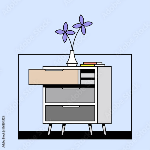 Modern Furniture Drawer with Flower and Books on Top of It	