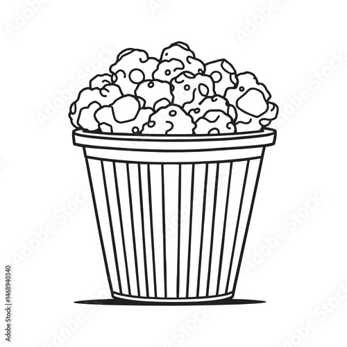 Popcorn bucket filled with fluffy popcorn kernels