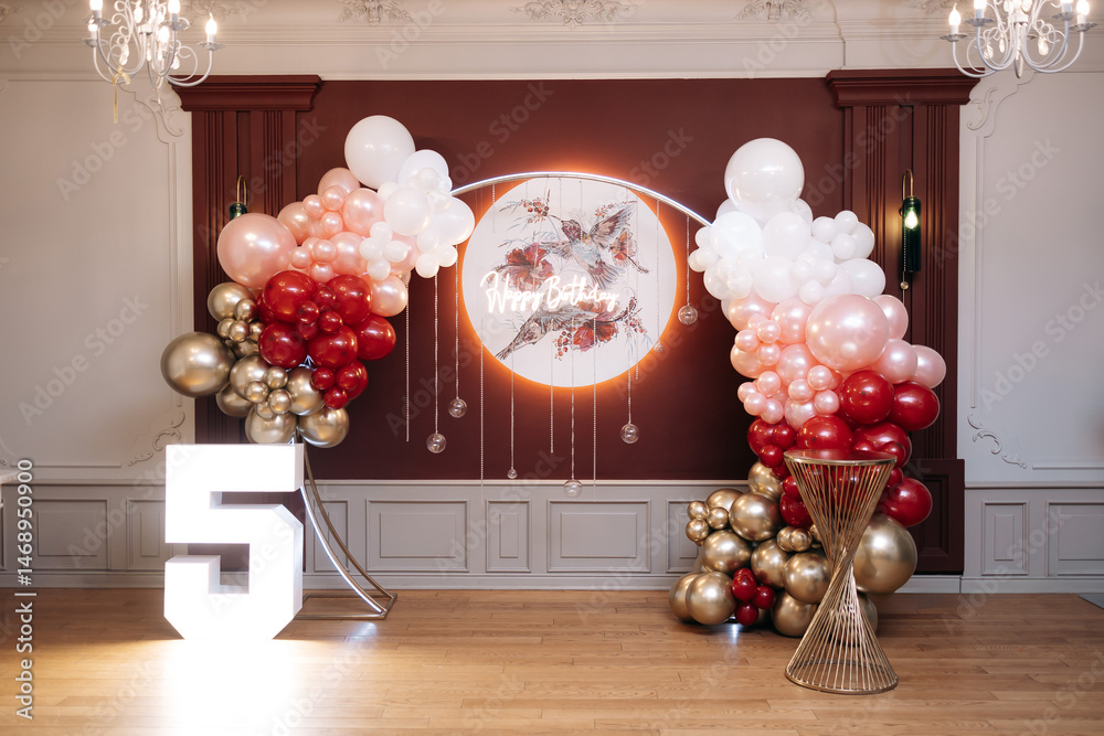 Red photo zone for birthday celebrations. Large elegant photo zone with lighting.