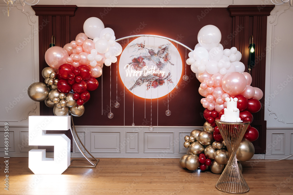 Red photo zone for birthday celebrations. Large elegant photo zone with lighting.