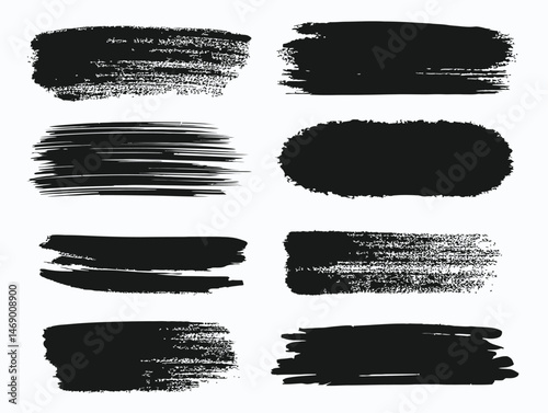 Black ink brush strokes on white paper texture.